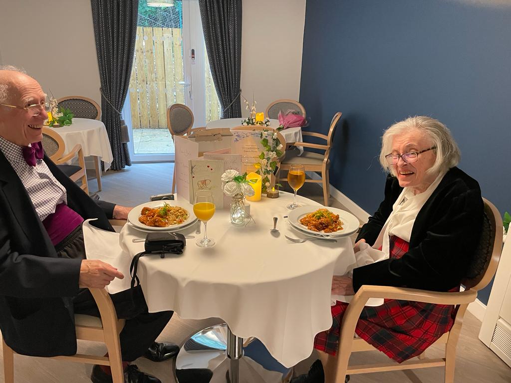 Resident and Husband Enjoying a Meal for Their Anniversary