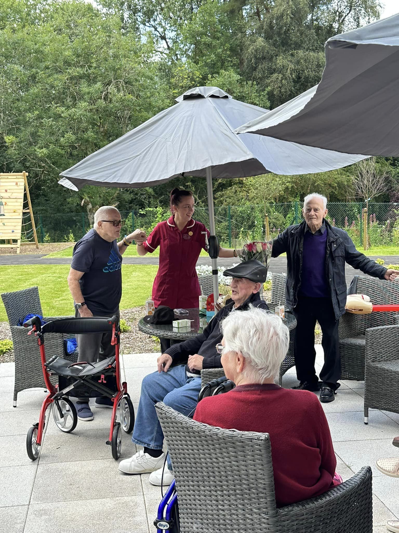 Residents Dancing with Staff Members