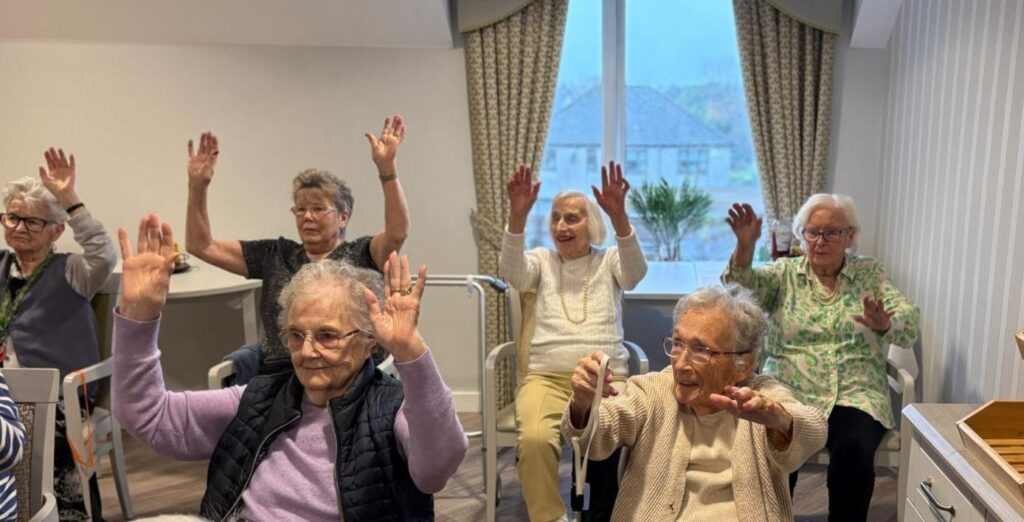 Seated exercise class in a care home