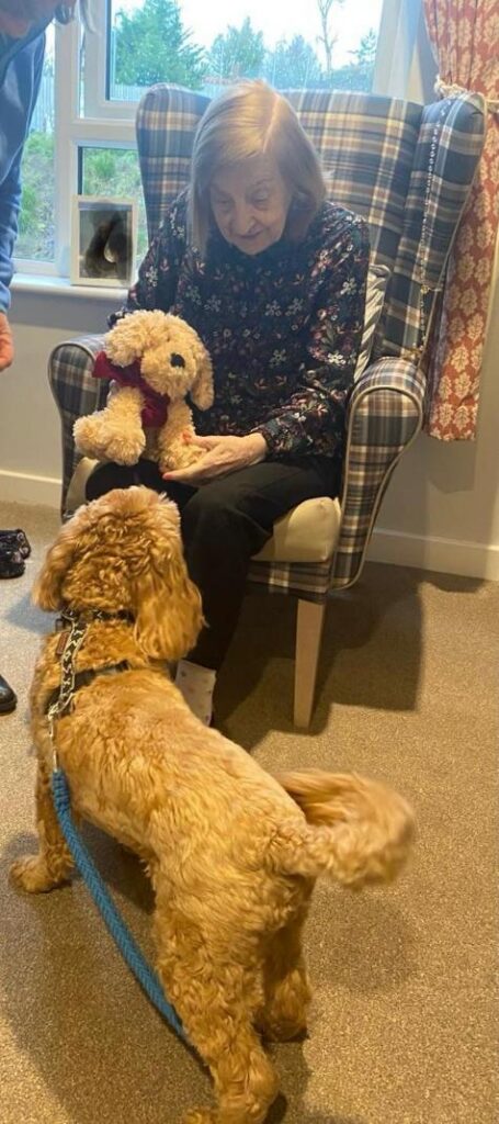 resident with therapy dog