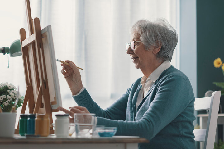 older woman painting