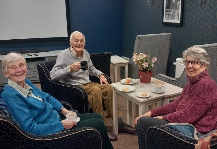 residents having a cup of tea in the lounge together