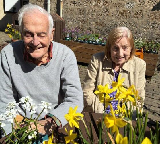 residents with flowers