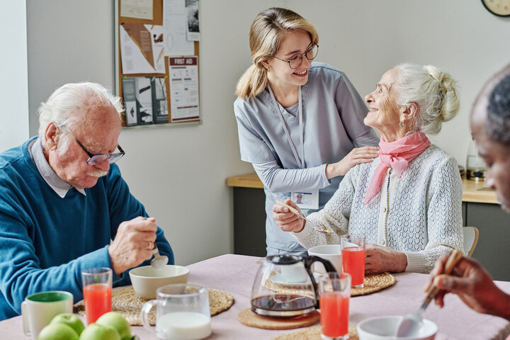 residents eating at a table